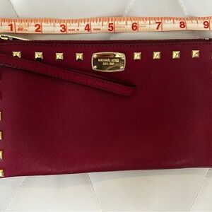 Michael Kors Red and Gold Clutch with Elegant Design
